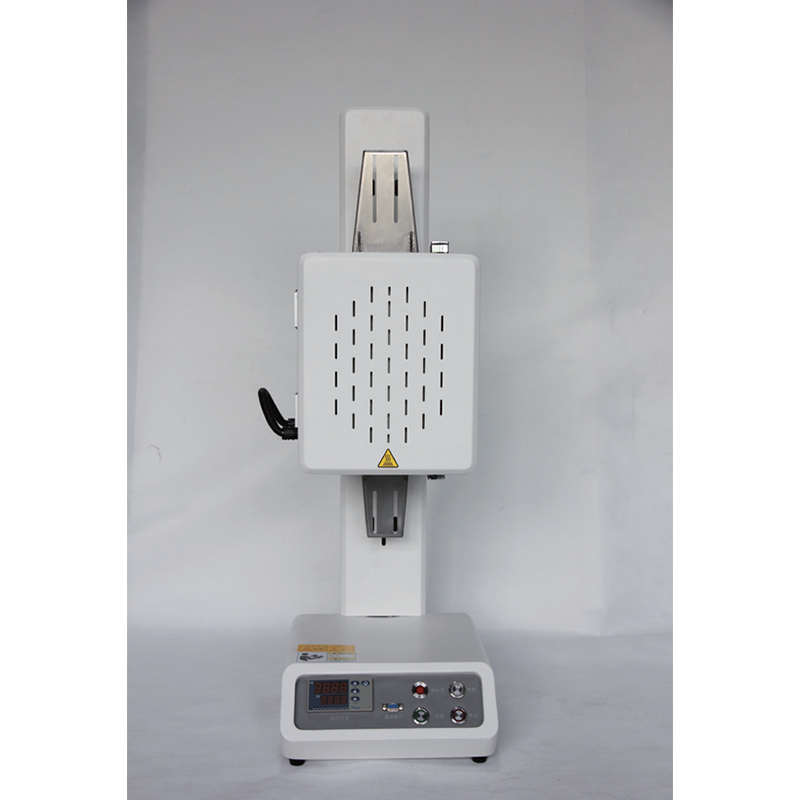 Solid oxide fuel button cell test device